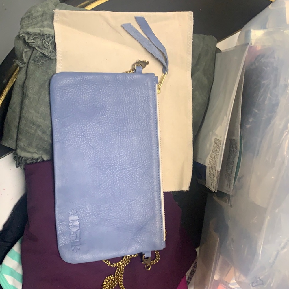 1951 blue petro clutch with strap and dust bag. Never used.